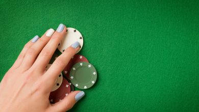live dealer - image of hand and chips on a table