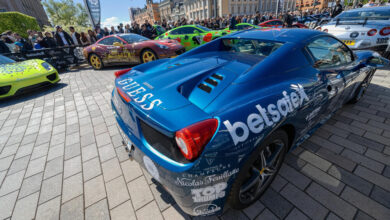 STOCKHOLM, SWEDEN - MAY 23: Gumball 3000 cars at display on the streets of Stockholm on May 23, 2015. People at the streets admiring the exotic cars at display before the start of the 2015 event.