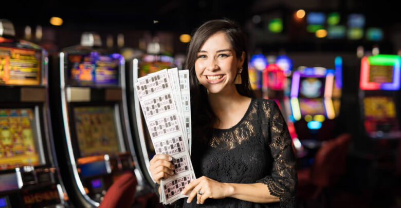 woman casino floor showing bingo lines winning strategy. woman is dressed in black
